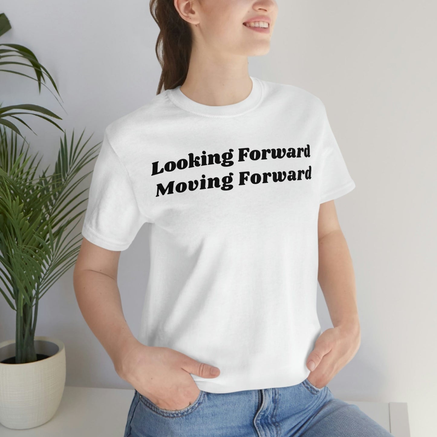 Looking Forward, Moving  Forward (Graphic Black Text) Unisex Jersey Short Sleeve Tee - Style: Bella+Canvas 3001